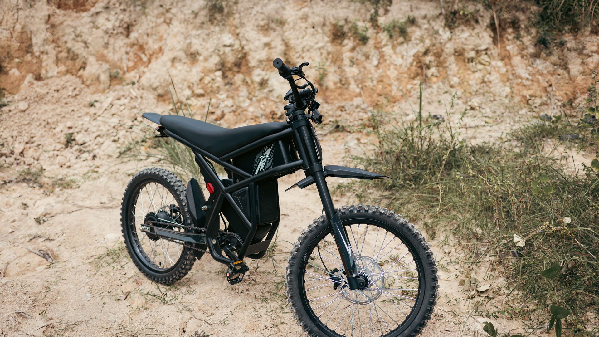 SUR-RON off-road electric bike on rocky terrain